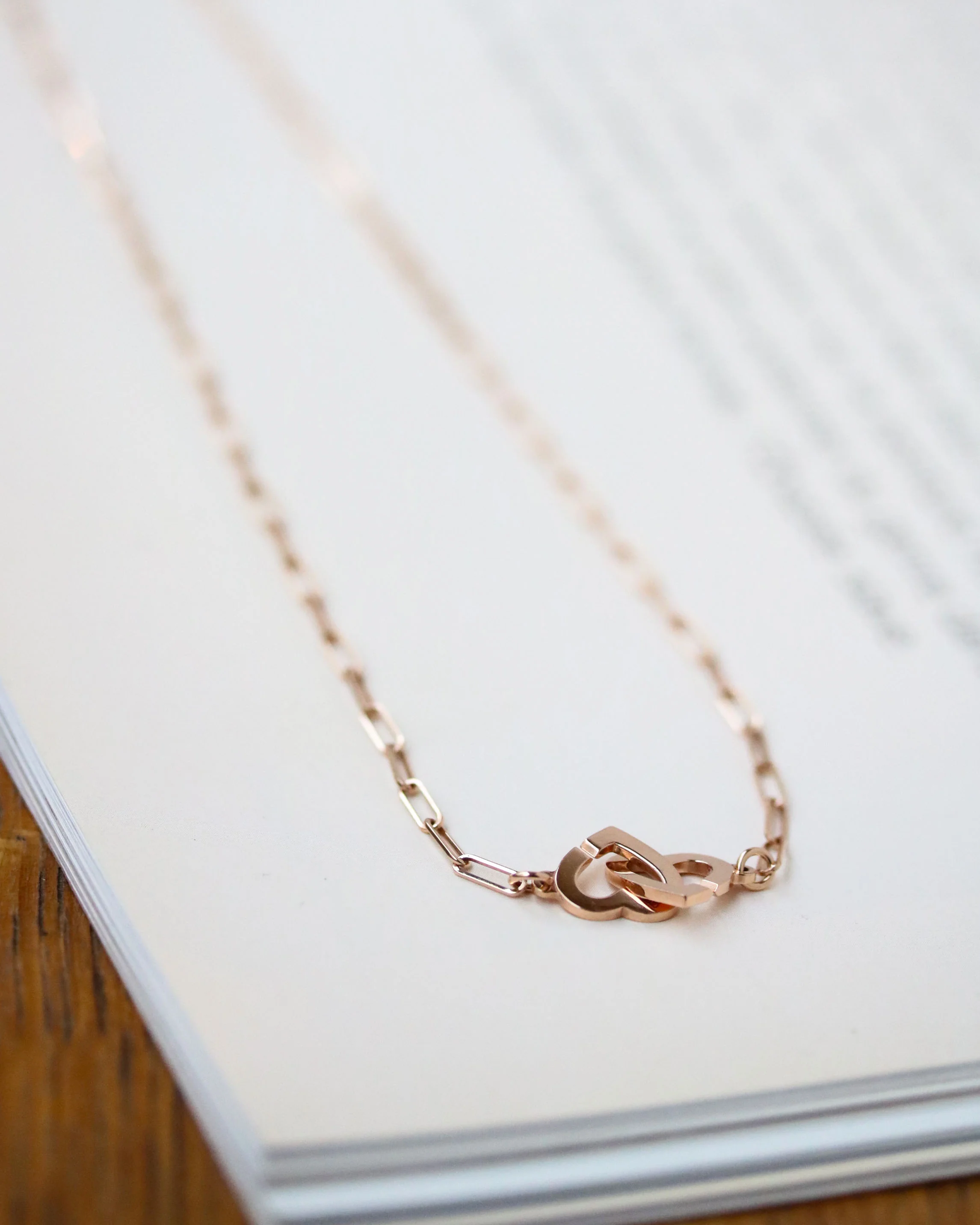 Collier Dinh Van "double coeurs" en or rose
