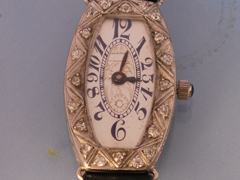 Montre ancienne platine diamants